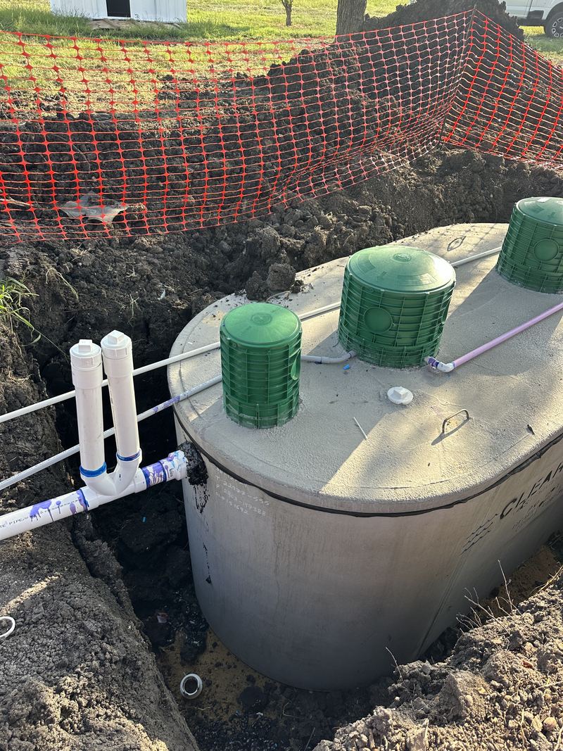 Aerobic tank risers and plumbing tied in