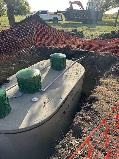 Aerobic tank set and left open for county inspection
