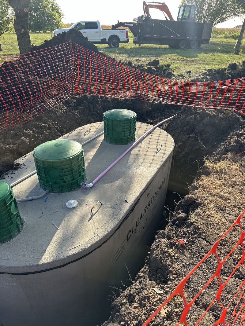 Aerobic tank set and left open for county inspection